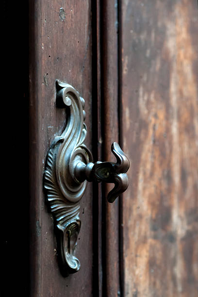 istock Old doorknobs, doorknockers and handles 517665960