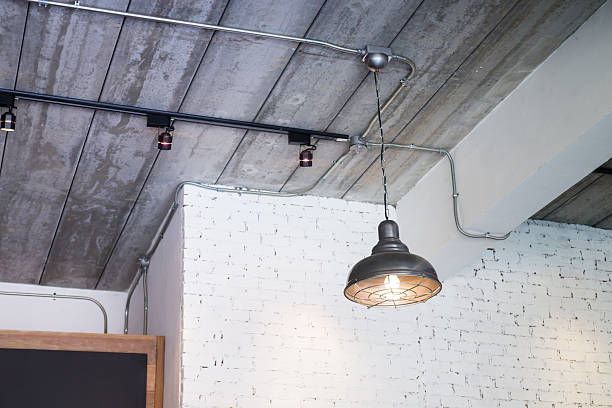 istock Black ceiling lamp in the room 517666724