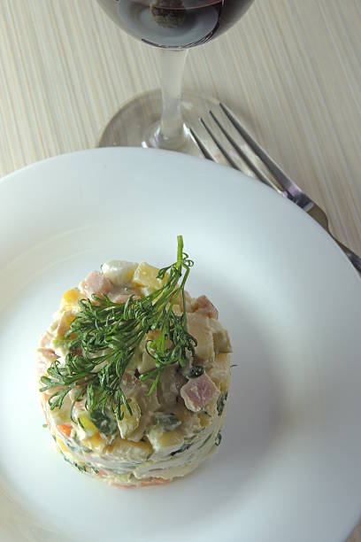 istock salad Olivier and wine 517667160