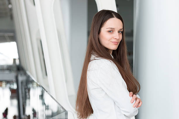 istock Confident business woman standing in office 517667434