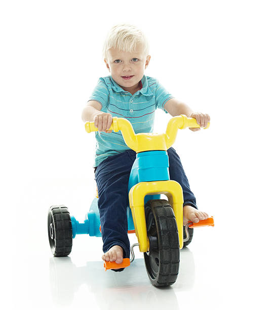 Little baby boy riding tricyclehttp://www.twodozendesign.info/i/1.png