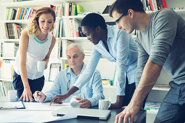 istock Multi-Ethnic Group of designers Have Meeting. 517672239