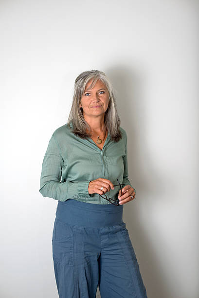 istock Beautiful Mature woman against white background 517672473
