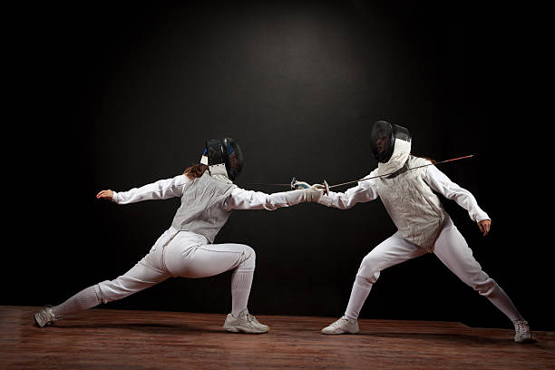 istock Two fencer women 517672553