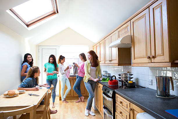 istock Young Female Students in the Kitchen 517673381
