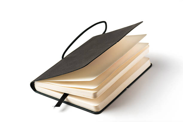 ブラックの注意ブックに隔てられた白の背景ます。 - book black isolated on white note pad ストックフォトと画像