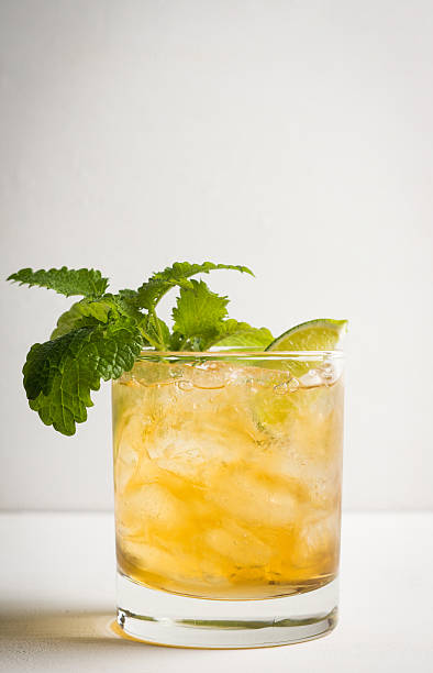 istock Old fashioned cocktail with lime and mint 517677460