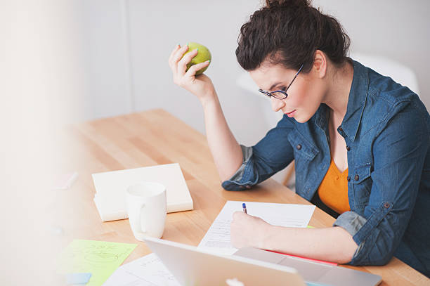 istock Attractive female worker is very busy 517677592