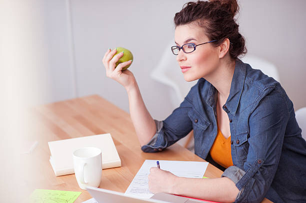 istock Beautiful female freelancer has a lot of work 517677696