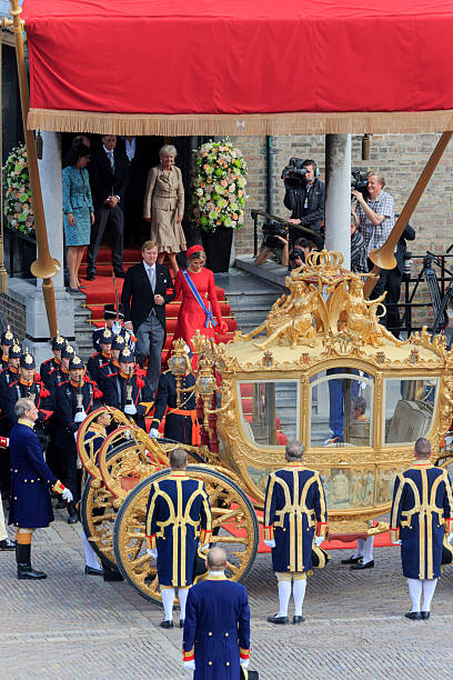 dutch royals leaving binnenhof during prinsjesdag in the hague - prinsjesdag stockfoto's en -beelden
