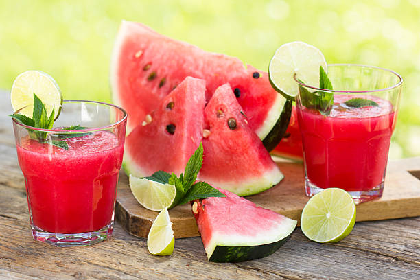 Watermelon smoothies with lime and mint stock photo