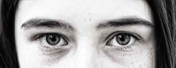 istock Female eye with long eyelashes close up 517684156