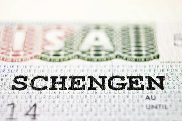istock Close up Schengen visa in the passport 517684364