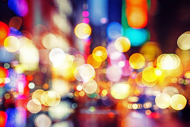 abstract defocused city street scene at night