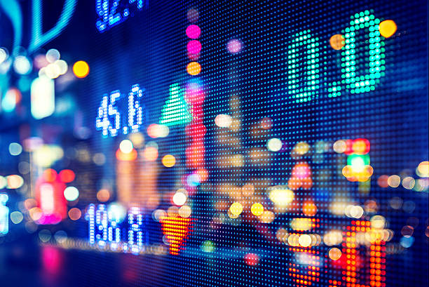 istock display stock market numbers and graph 517687594