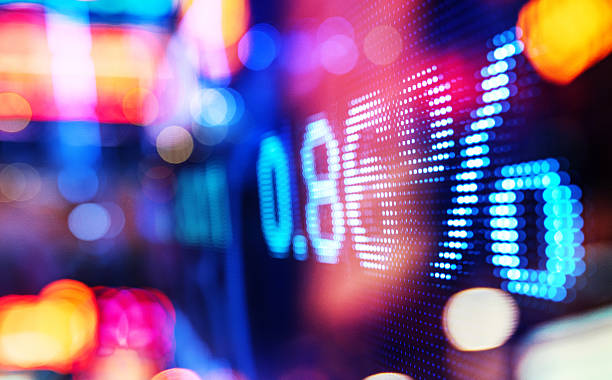 istock display stock market numbers and graph 517687648