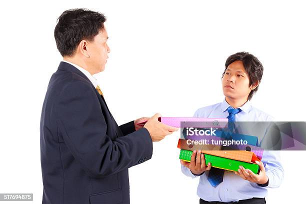 Business Man Giving Jobs To Worker Stock Photo - Download Image Now - Adult, Archives, Blue