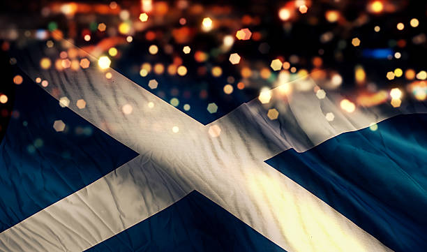 istock Scotland National Flag Light Night Bokeh Abstract Background 517695215