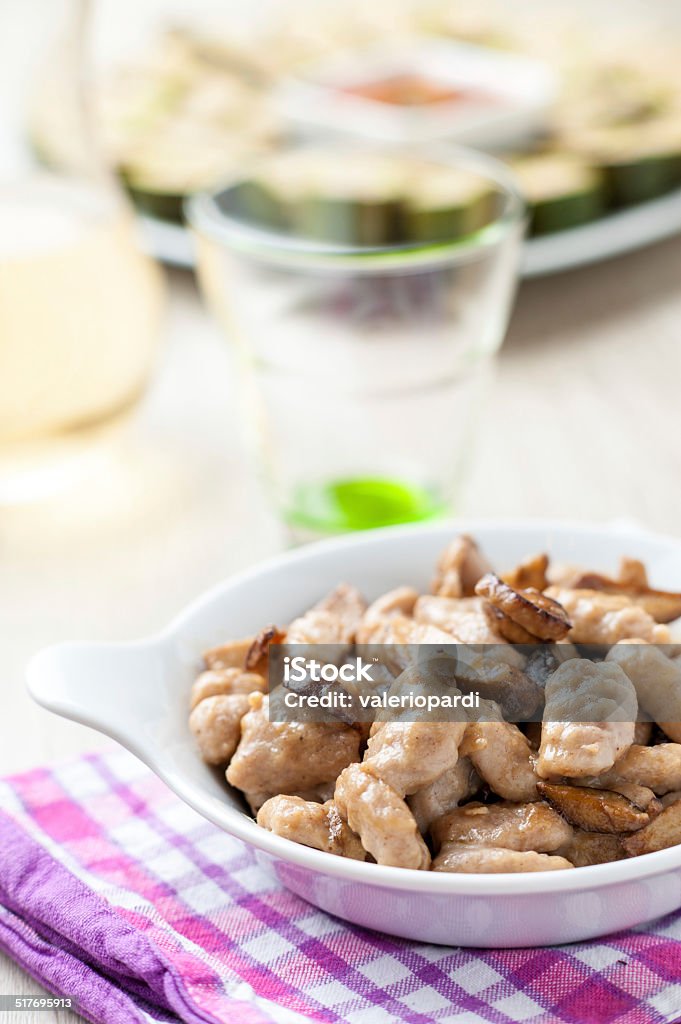 Homemade gnocchi with various sauces Homemade gnocchi with various sauces served in a plate on the table Boiled Stock Photo