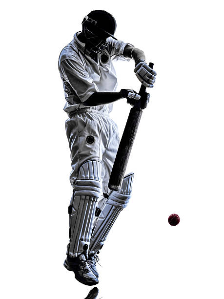 istock Cricket player  batsman silhouette 517695931