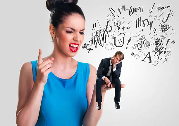 Photo of Woman yelling at a man