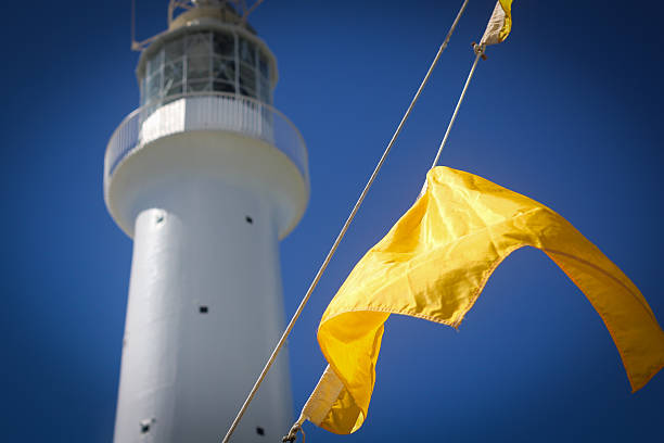 Lighthouse nautical flag stock photo
