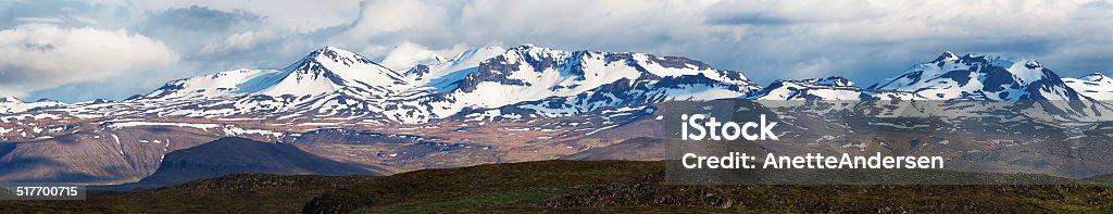 Mountain landscape in Iceland, panorama. Panoramic image of scenic snow clad Mountains in iceland. Deep Snow Stock Photo