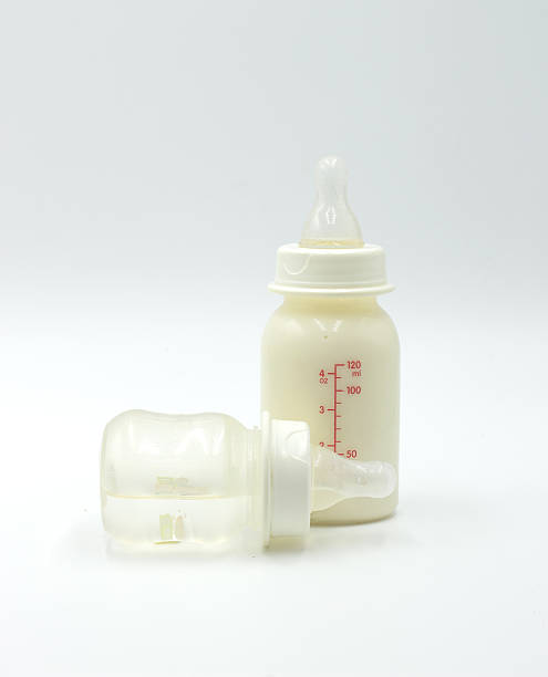 istock milk and water baby bottle 517702190