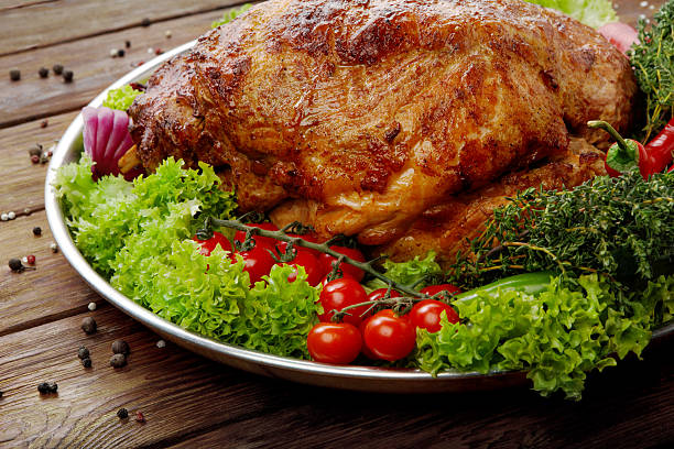istock Roasted pork shoulder with vegetables, meat dish 517702398
