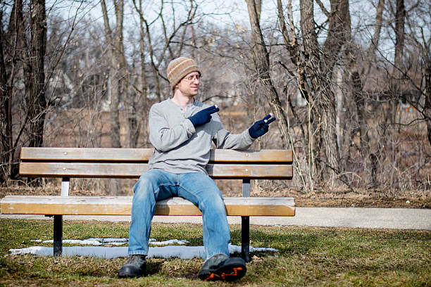 istock Homeless man on a bench 517702668