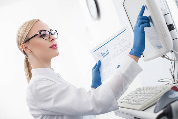 istock Experienced female scientist is doing her research 517703004