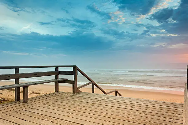 Photo of Travel destination: Cote d'Argent, beach of Mimizan Plage with sunset