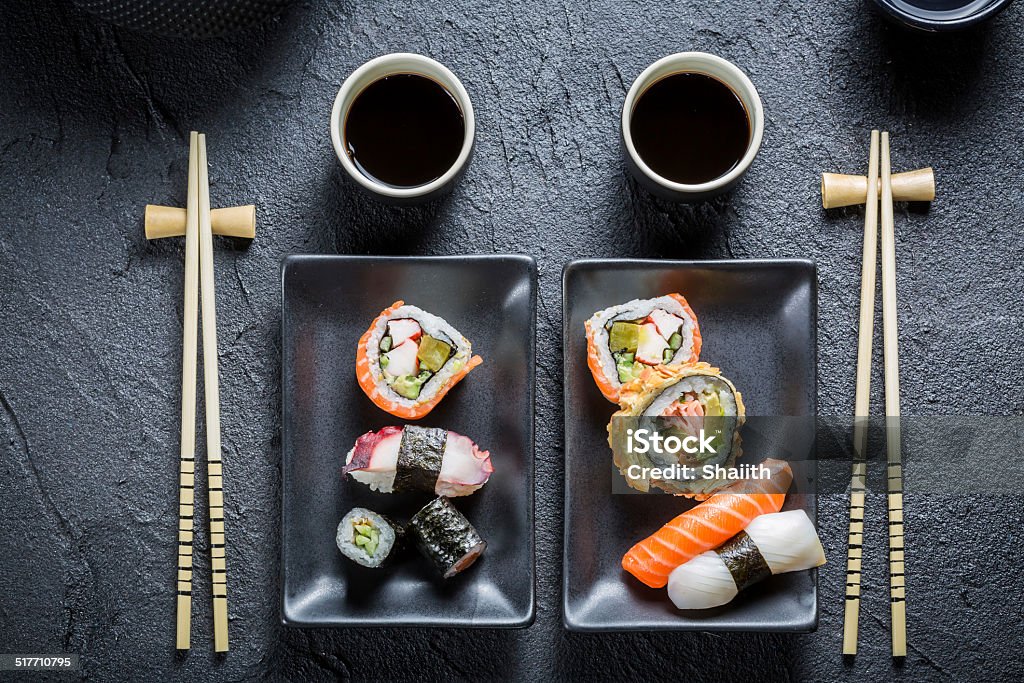 Closeup of sushi for two people Sushi served with soya sauce for two people Asia Stock Photo