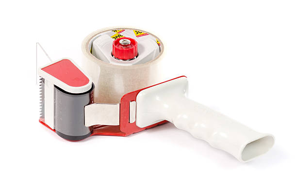 istock Adhesive tape holder with a red pen. 517711301