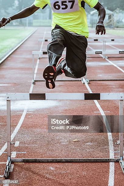 Young Man During Training In Hurdle Race Stock Photo - Download Image Now - Activity, Adult, African Ethnicity