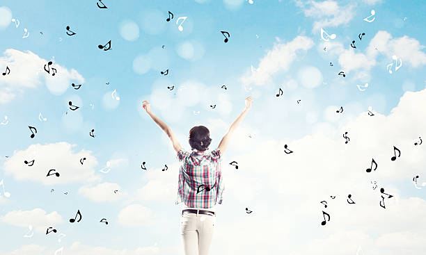 istock Girl with headphones 517714465