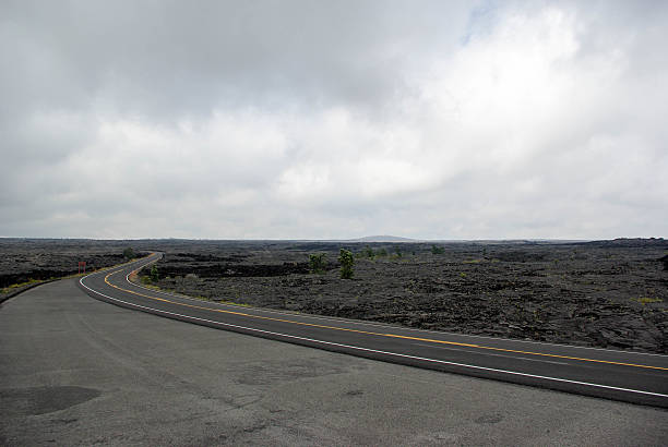 istock lava and winding road in Kilauea Volcano 517714482