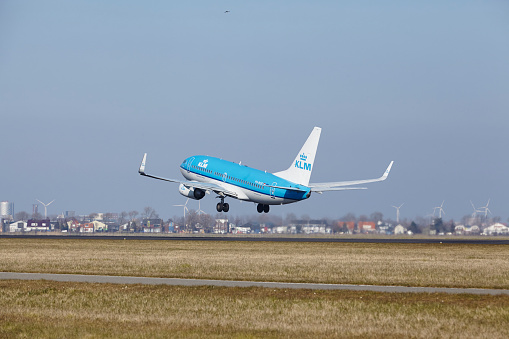 Amsterdam, The Netherlands - March 13, 2016: The KLM Boeing 737-7K2 with identification PH-BGR takes off at Amsterdam Airport Schiphol (The Netherlands, AMS), Polderbaan on March 13, 2016.