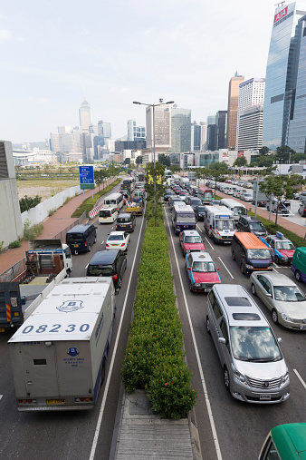 Hong Kong, Hong Kong SAR - October 10, 2014: Vehicles are locked in a traffic jam on a road in Central District, Hong Kong. Traffic jam is a serious problem in Hong Kong.