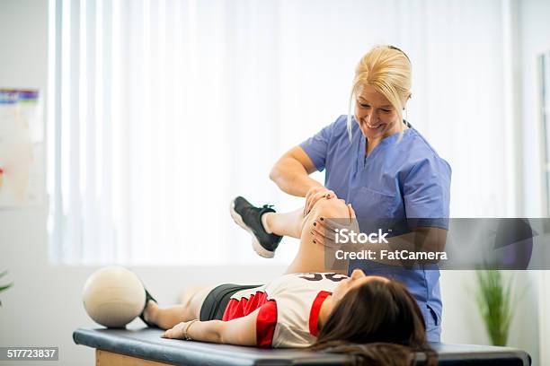 Physical Therapy Stock Photo - Download Image Now - Doctor, Medical Exam, Teenager