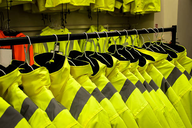 istock Yellow safety fluorescent jackets Hanged up 517725413