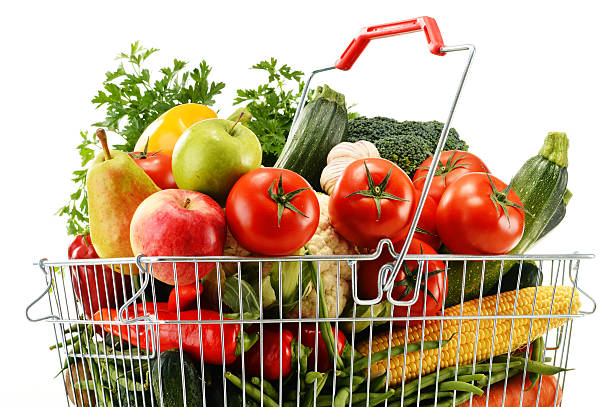 istock Wire shopping basket with groceries isolated on white 517725609