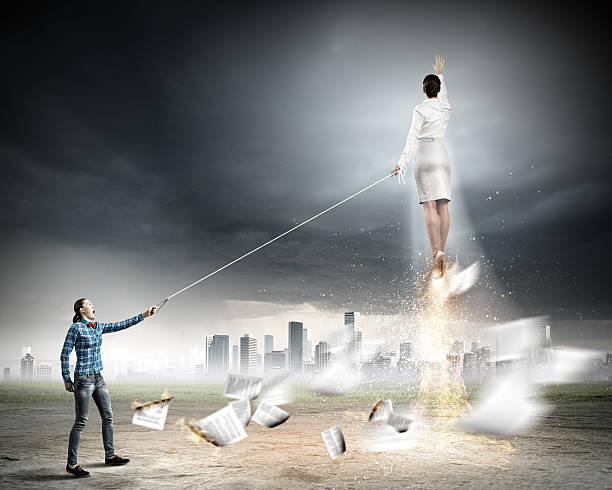 istock Flying businesswoman 517725743
