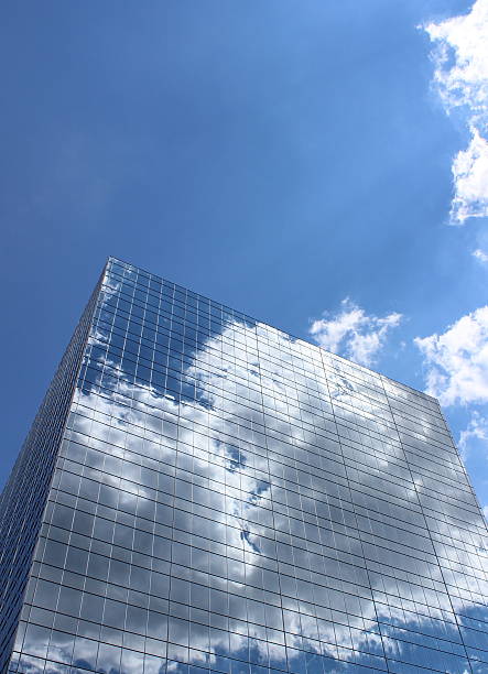 istock Modern Skyscraper of a business building reflected in the sun. 517727263