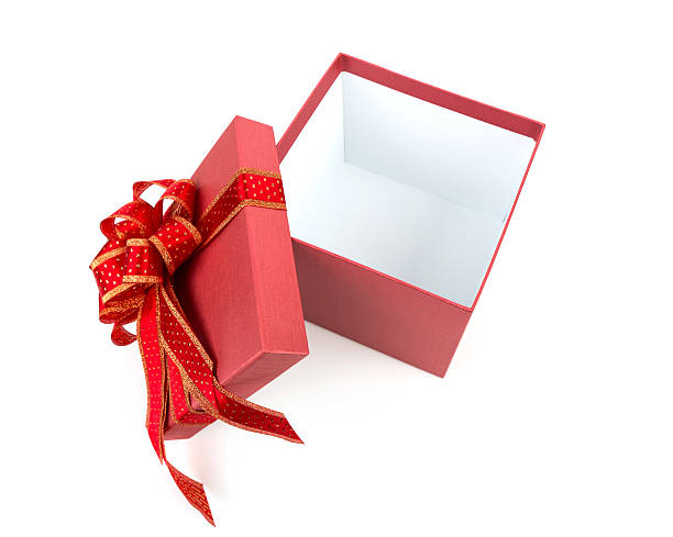 istock gift box with red and glod ribbon on white background 517727755