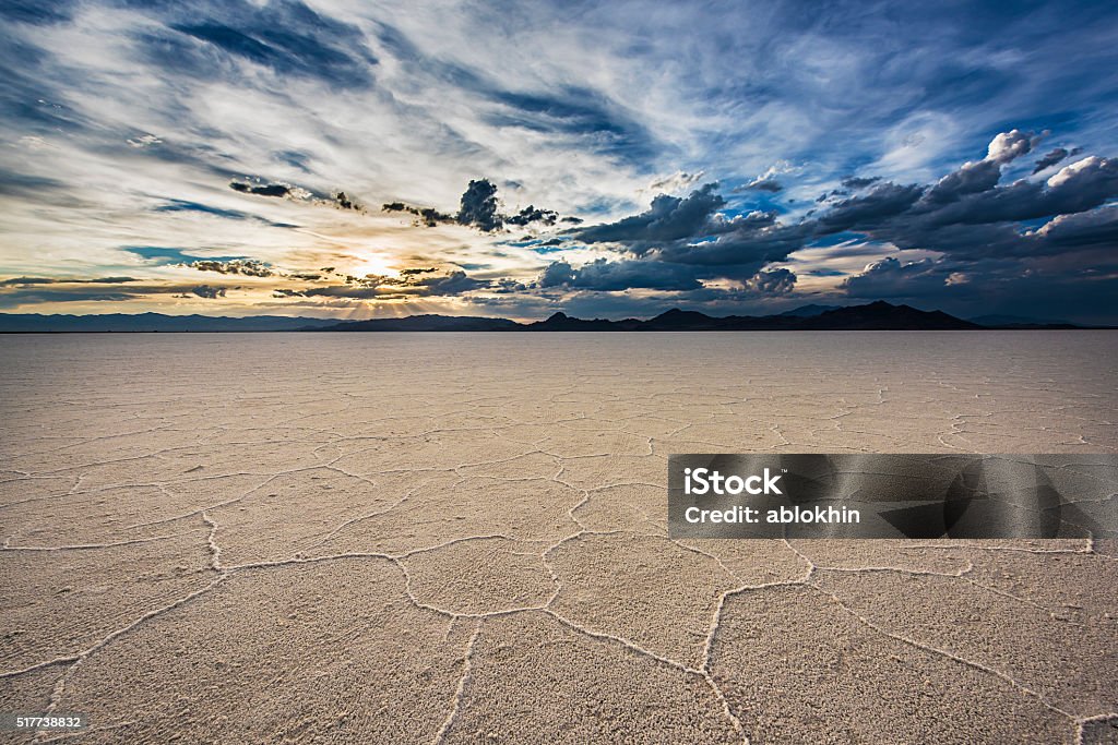 White Salt Flats with sunset near Salt Lake City, Utah White Salt Flats with dramatic sunset near Salt Lake City, Utah Desert Area Stock Photo
