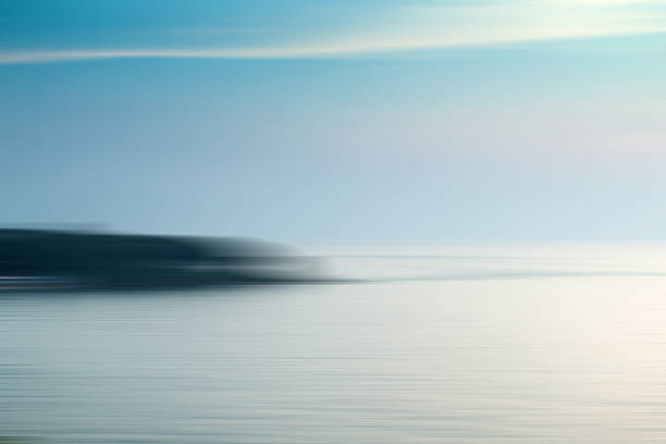 istock Motion blurred background of refraction in the sea 517741592