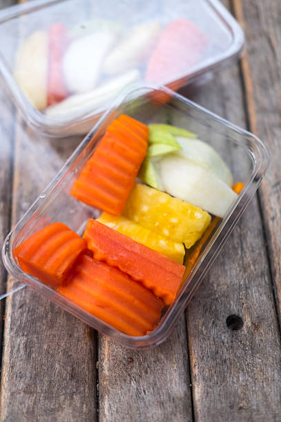 istock ripe papaya, guava and pineapple in plastic box 517742880