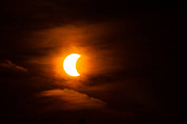 istock partial solar eclipse on 9 of March 2015 in Bangkok 517743912