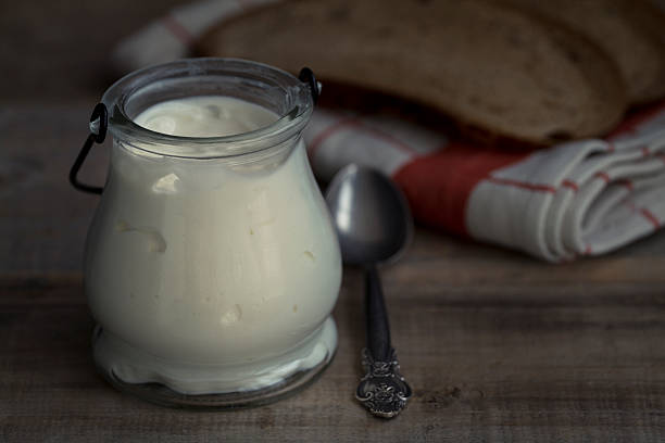 istock Greek Yogurt on a vintage wood background 517744730